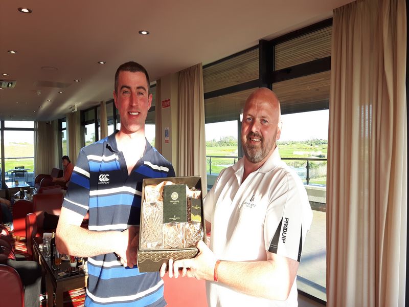 Moyvalley winner Brian Heverin (left) with Stephen Kelly event sponsor presenting.